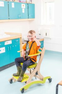 Smirthwaite boy in chair